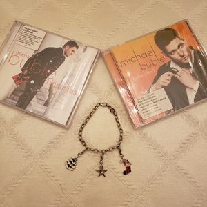 CD bundle. 2 Michael Buble cds. And a Christmas themed bracelet.